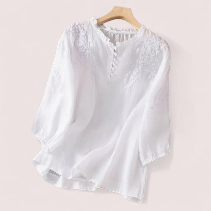 Elira Stockholm™ | Blus i bomullsvoile med broderade axlar